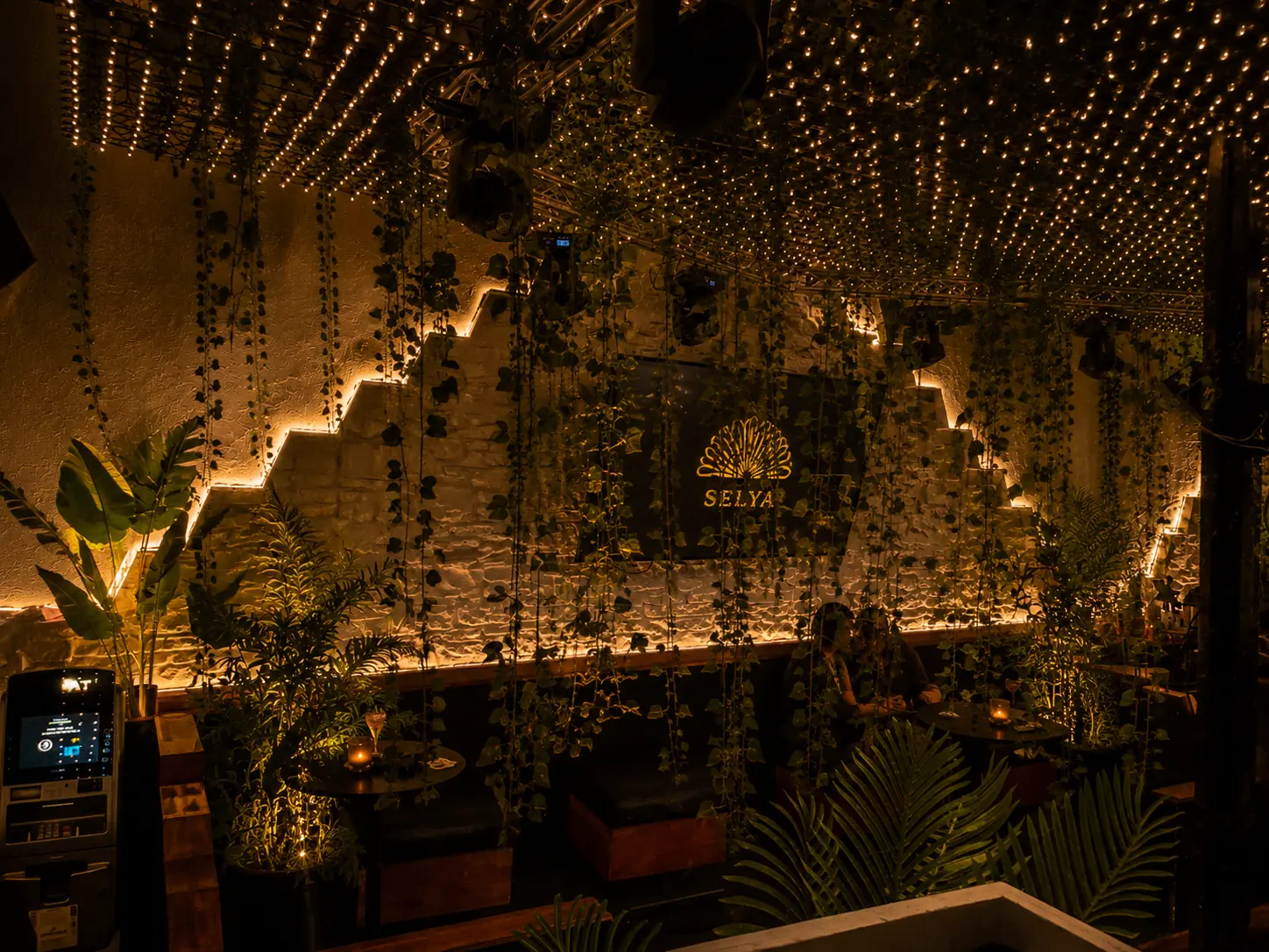 Nightform concept render for Blindside Lounge: illuminated feature wall with greenery